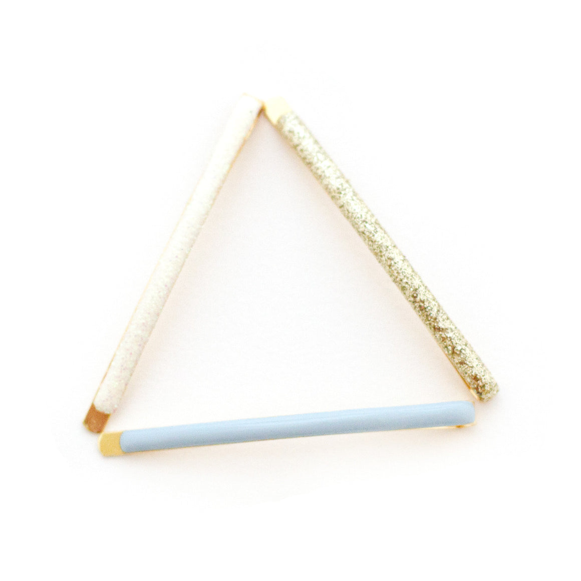 the dream date bobby pin package features gold iridescent and blue enamel glitter hair pins